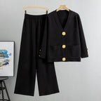 Ensemble femme noir, pantalon large et veste à boutons dorés décoratifs, style élégant